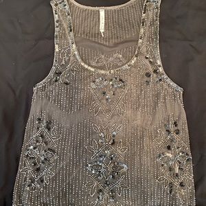 Beautiful hand-stitched, sequin and bead blouse!